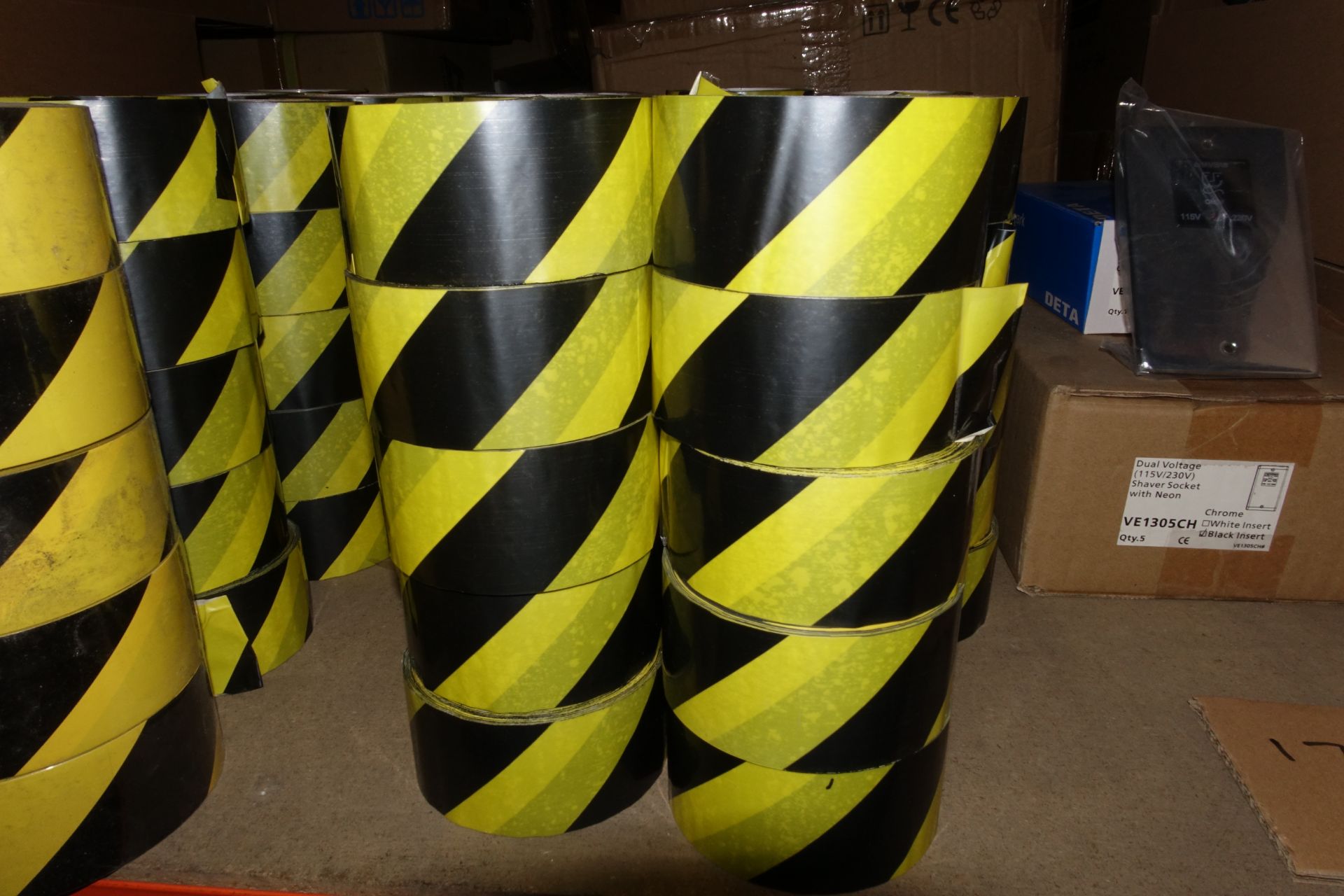 105 x Rolls of Yellow and Black Stripped Tape