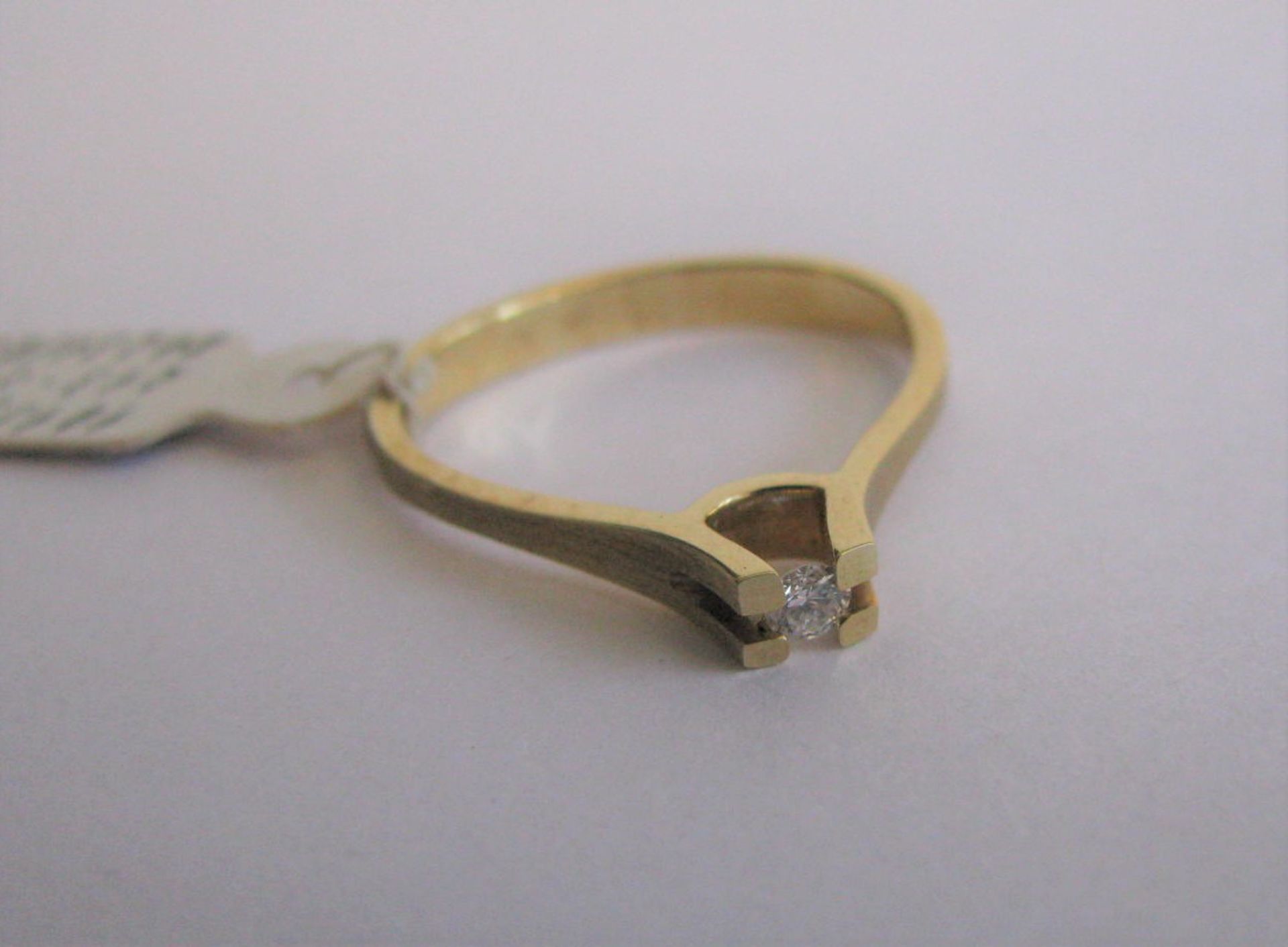 Solitär-Ring, Brillant, ca. 0,066 ct, TW IF, 585er Gelbgold, gepunzt, 2,4 g, rhodiniert, Juweliersi