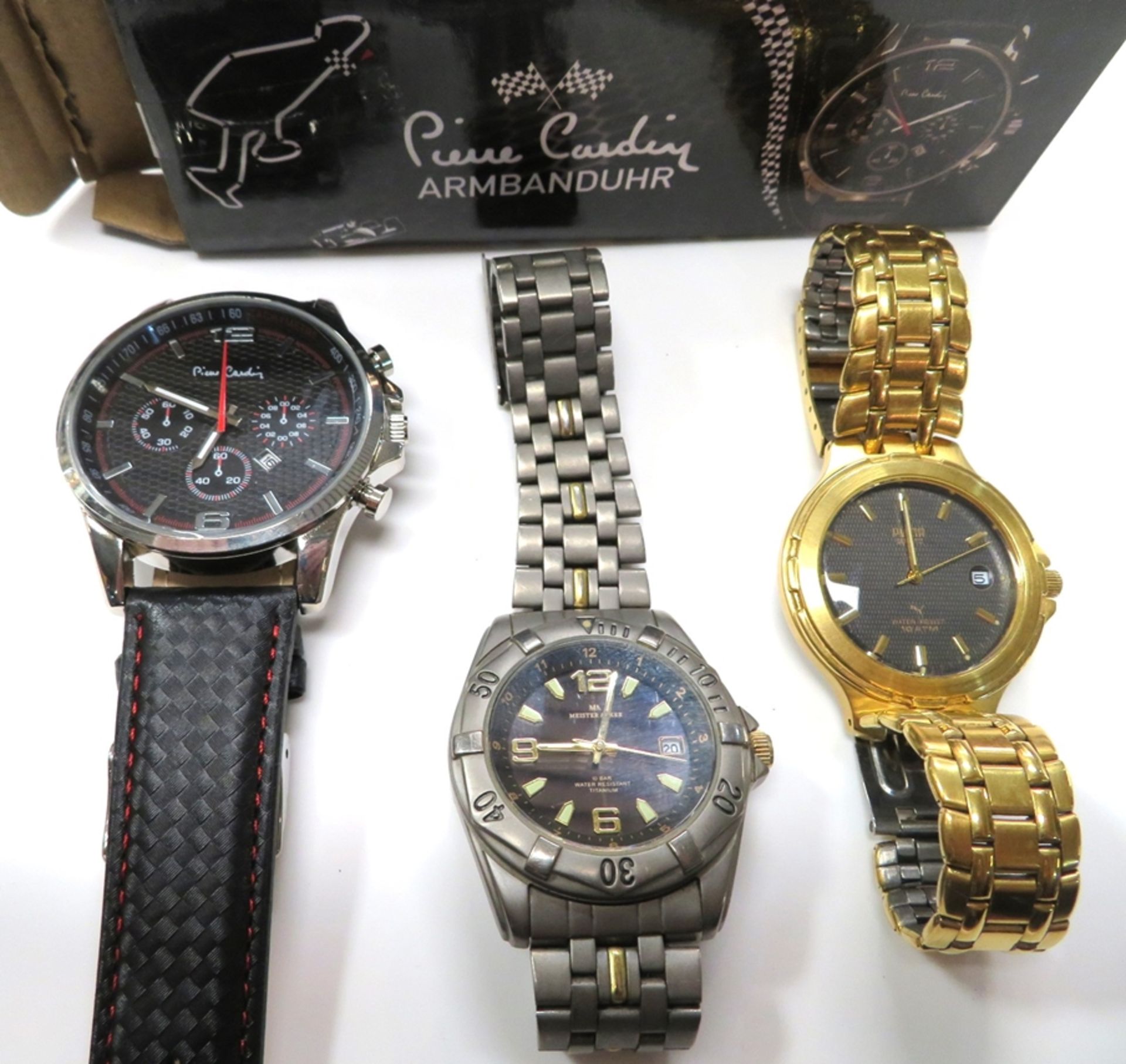 3 diverse Armbanduhren, Pierre Cardin, Meisteranker und Puma, Quarzwerke, gem.
