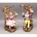 2 Biskuitporzellanfiguren, Mädchen und Junge auf Schaukeln, Biskuitporzellan mit polychromer Bemalu