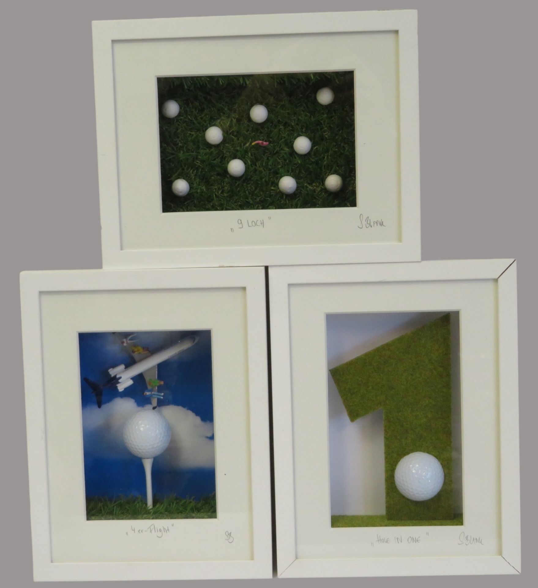 Blank, Susanne, 3 Sportart-Objekte zum Thema Golf, sign., in Glasvitrinen, 20,5 x 26,5 x 5,4 cm.