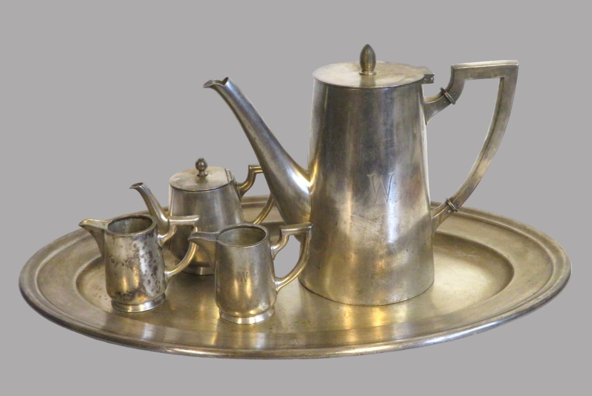5 teiliges Konvolut diverser versilberter Objekte, bestehend aus Kaffeekanne, Mokkakännchen, 2 Sahn