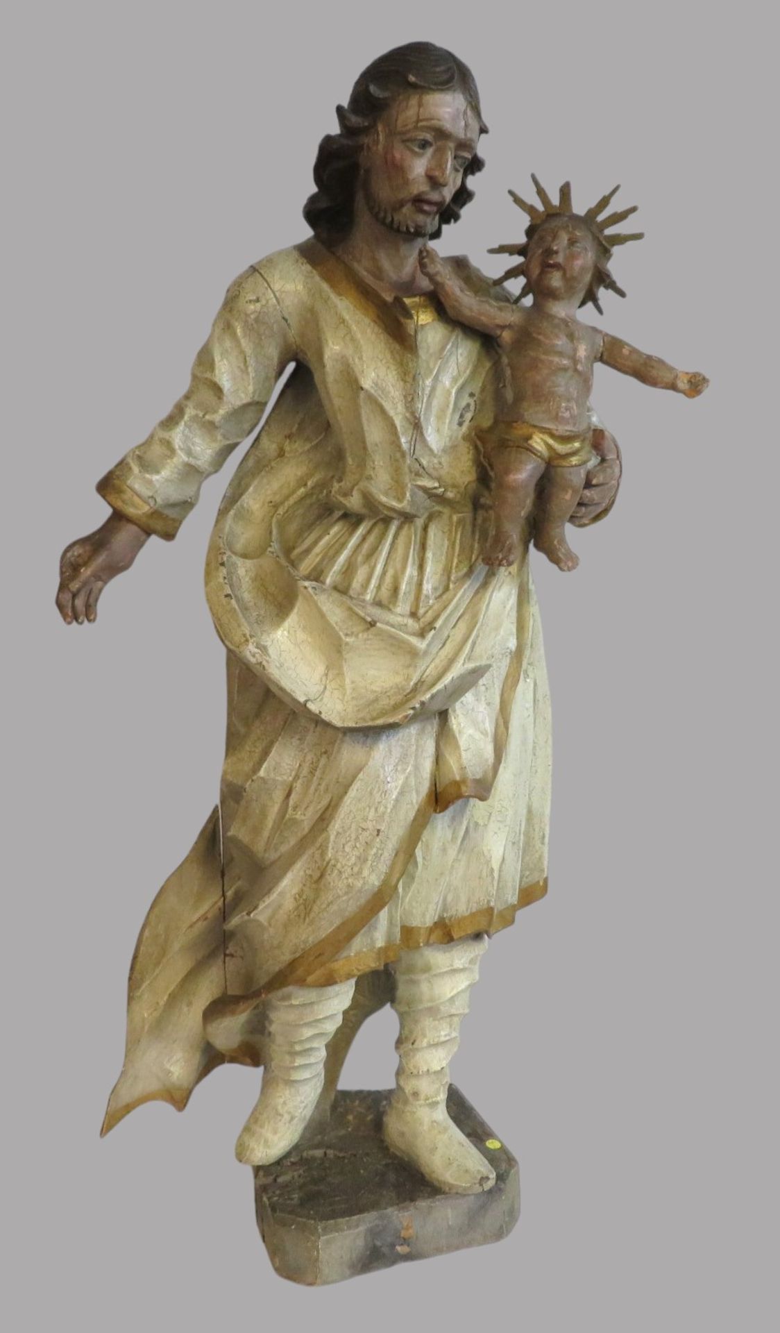 Heiliger Josef mit Kind, Süddeutsch, 18. Jahrhundert, Lindenholz geschnitzt, farbig gefasst, rücks.