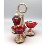Menage, Biedermeier, Mitte 19. Jahrhundert, rot eingefärbtes Glas mit feiner Goldmalerei, geschliff