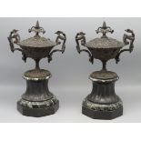 2 Kaminvasen, Frankreich, um 1900, Bronze, reich verziert, Füsse Marmor, h 31 cm, d 19 cm.