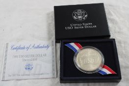 1991 United States USO Silver Dollar in Box COA