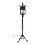 Two Continental wrought iron standard lamps, one with a Gothic-style lantern, height 140cm, the