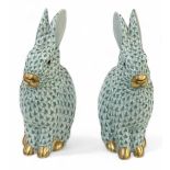 HEREND; a pair of Hungarian porcelain figures of rabbits, both with green fishnet pattern, height