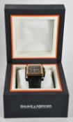 BAUME & MERCIER; a gentleman's Hampton Magnum XXL steel and red gold wristwatch, model no. MOA08825,