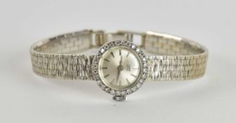TUDOR; a lady's 9ct white gold Royal wristwatch, with crown wind movement, the silvered dial set
