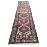 ECARPETGALLERY; a modern handmade 100% wool Turkish red ground geometric design runner, 415 x
