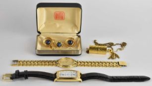 A gentleman's Orvis wristwatch, the white enamel double clock face dial with smaller date aperture