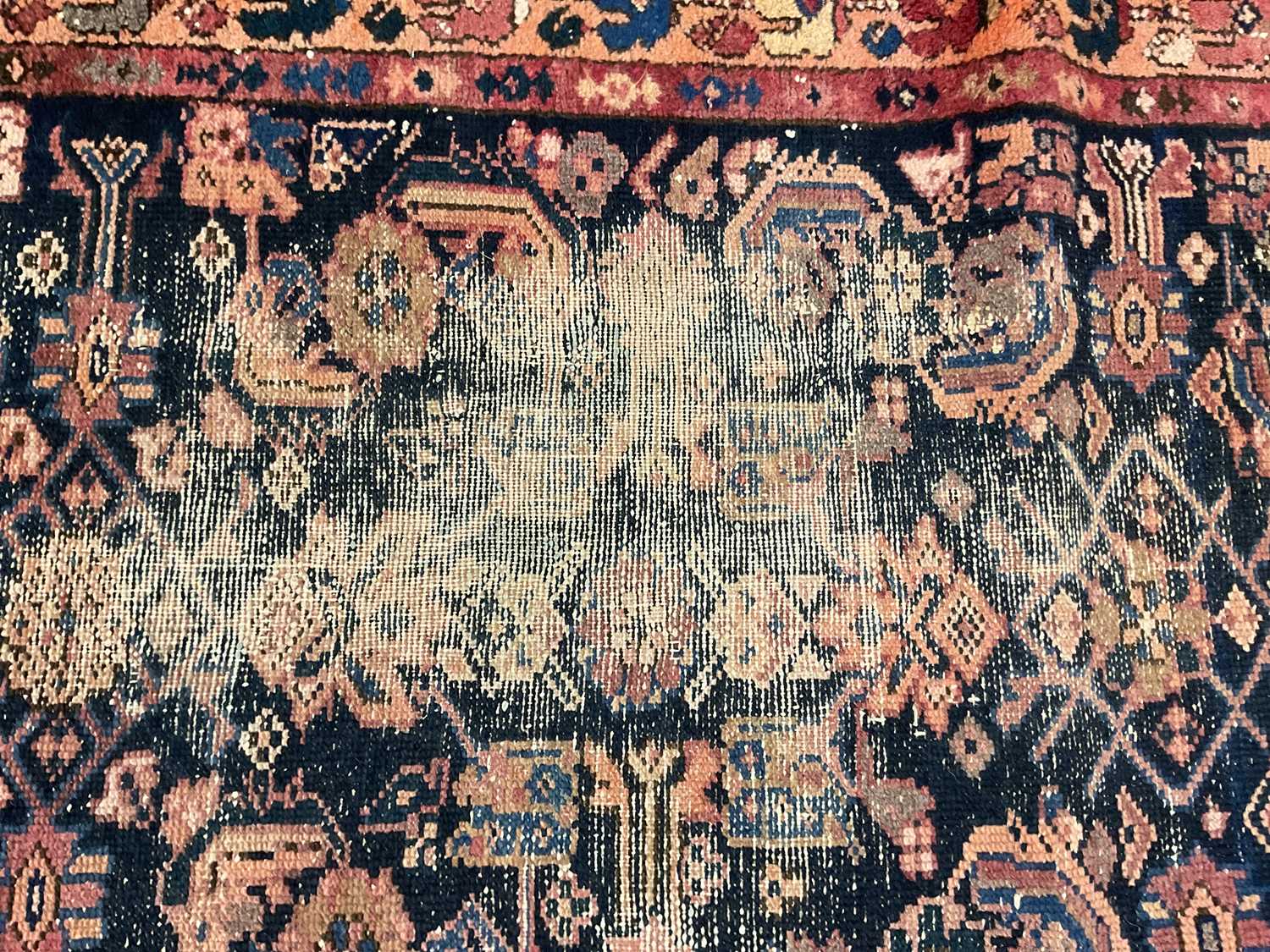 An antique Persian blue and red ground runner, the central blue ground panel decorated with foliage, - Image 2 of 3