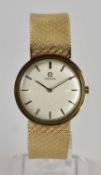 OMEGA; a gentleman's 9ct gold wristwatch, the silvered dial set with raised baton markers and minute