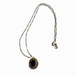 Gold Necklace with Garnet