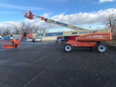 JLG 1350SJP BOOM LIFT SN:0300105104 4x4, powered by diesel engine, equipped with 135ft. Platform