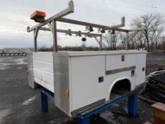9FT. READING STEEL UTILITY BODY SN:757825 equipped with stainless ladder rack, fits one ton dually.