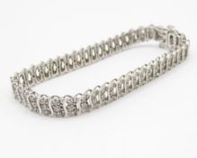 9ct gold diamond triple row tennis bracelet (15.6g)