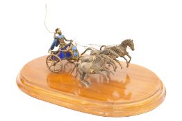 Silberner Vierpferde-Streitwagen auf Holzsockel | Silver Four-Horse Chariot on Wooden Base