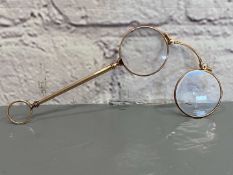 A pair of late 19th century Continental, gold, &nbsp;folding Lorgnettes,