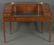 Schreibtisch in Nierenform. Frankreich 20. Jh. Mahagoni furniert, mit Band- und Fadeneinlagen;