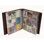COLLECTION OF ASSORTED AMERICAN SPORTS CARDS IN ALBUM