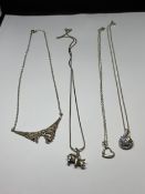 FOUR MARKED SILVER NECKLACES WITH PENDANTS