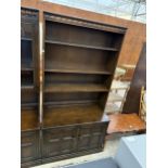 AN ERCOL ELM DRESSER WITH FOUR TIER PLATE RACK AND CUPBOARDS TO BASE, 38.5" WIDE