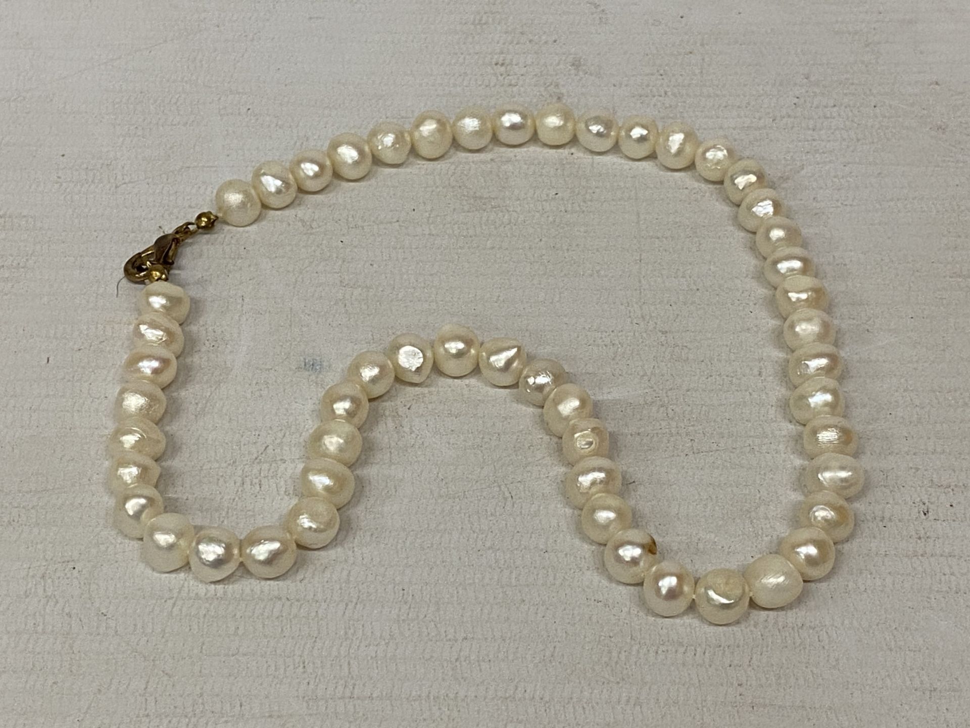 A PEARL NECKLACE