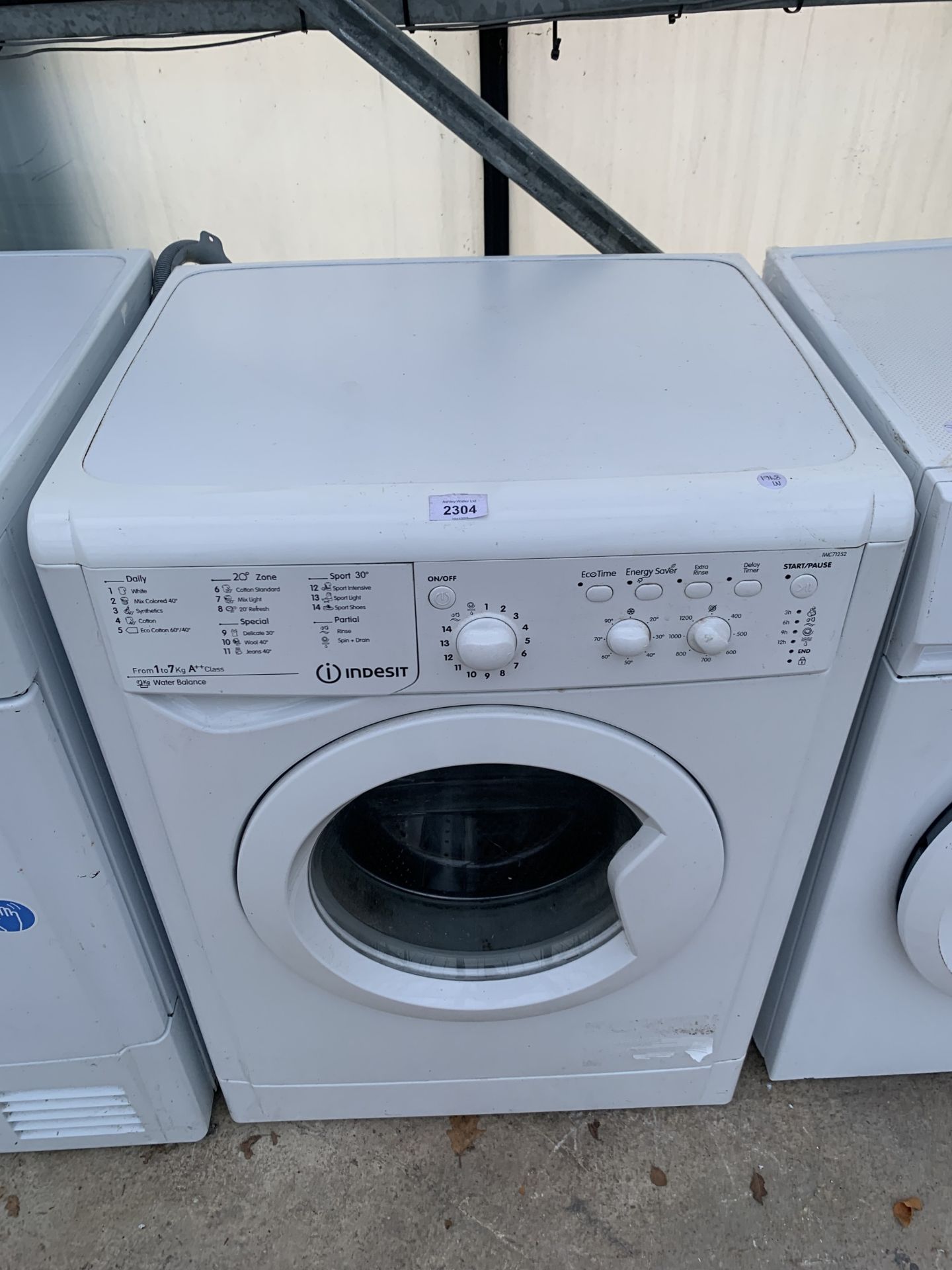 A WHITE INDESIT 7KG WASHING MACHINE