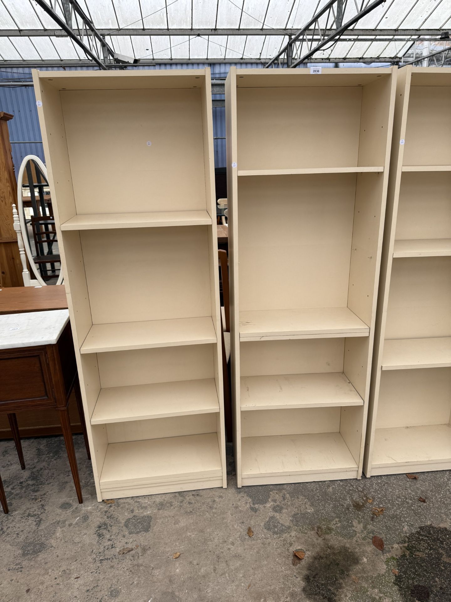 TWO CREAM OPEN STORAGE SHELVES, 23" WIDE EACH