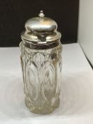 A GLASS POT WITH A HALLMARKED SHEFFIELD HINGED LID