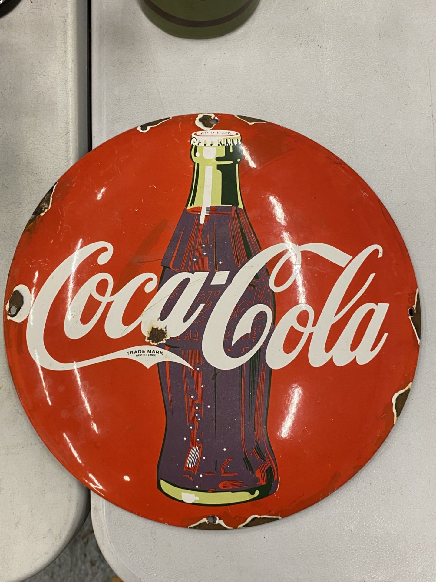AN ENAMEL COCA-COLA SIGN