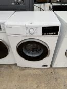 A WHITE KENWOOD K714WM18 WASHING MACHINE