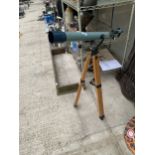 A PRINZ ASTRAL 400 TELESCOPE WITH WOODEN TRIPOD STAND