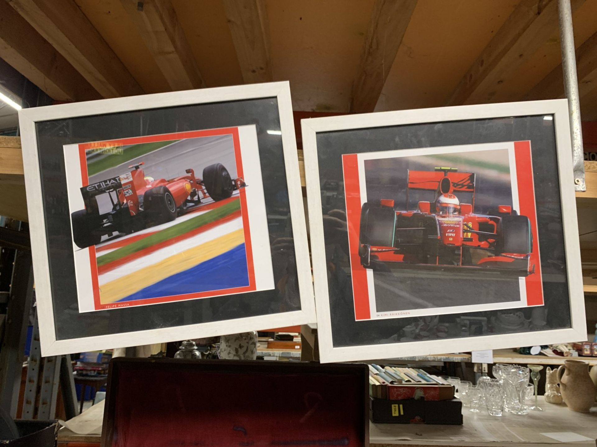 TWO FRAMED PHOTOGRAPHIC PRINTS OF F1 CARS TO INCLUDE FELIPE MASSA AND KIMMI RAIKONNEN