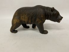 A LARGE BLACK FOREST BEAR, HEIGHT 20CM, LENGTH 35CM