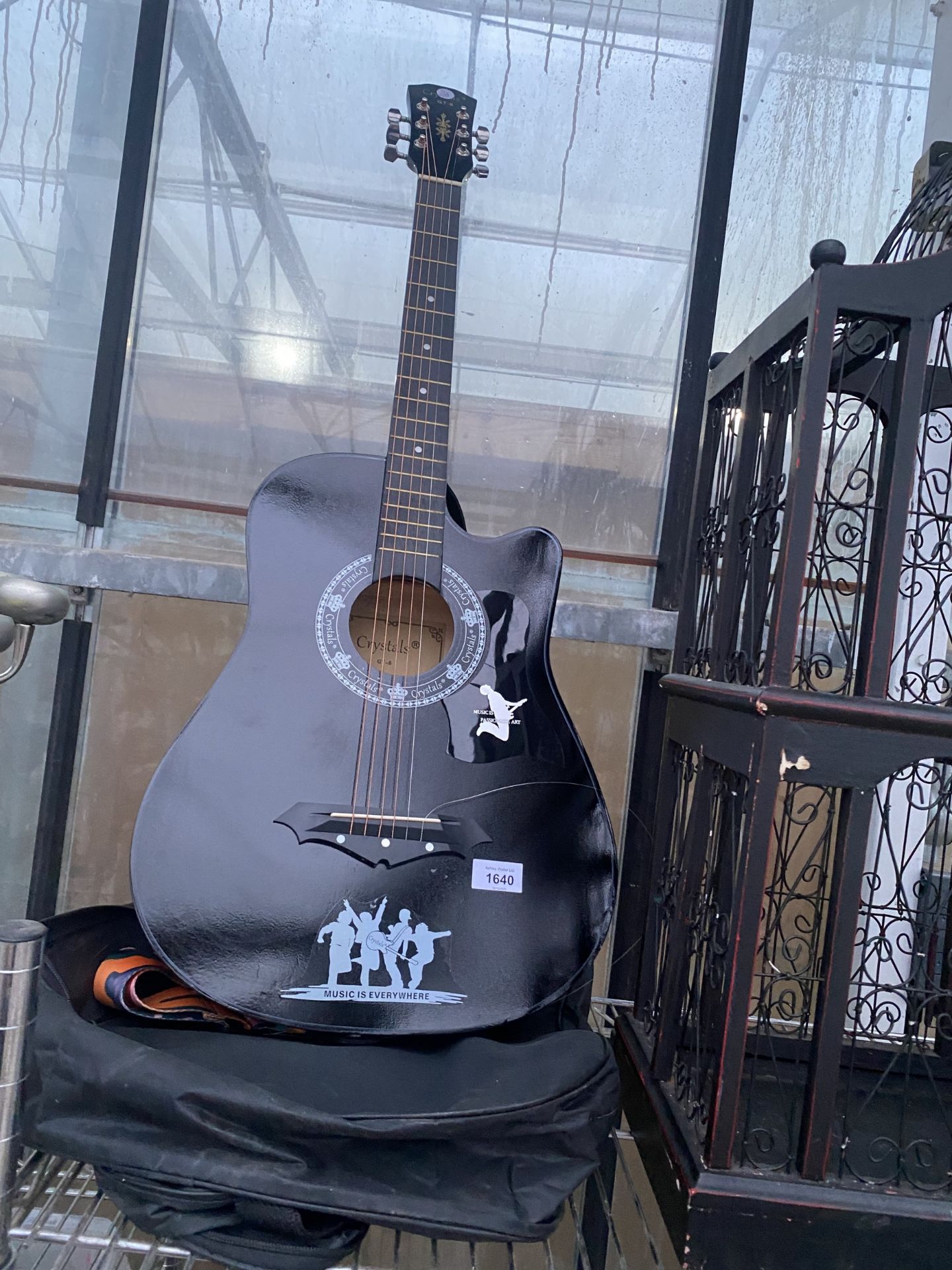 A CRYSTALS GT-6 ACOUSTIC GUITAR