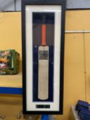 A CRICKET BAT SIGNED BY THE ASHES TOUR 20/20 ENGLAND TEAM AT OLD TRAFFORD, AUGUST, 2009 - FRAMED AND