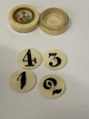 AN ANTIQUE MINIATURE BONE COUNTER HODER WITH PORTRAIT TO THE LID, CONTAINS COUNTERS