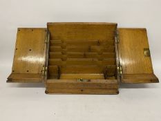 A VINTAGE OAK STATIONERY BOX WITH LOWER DRAWER