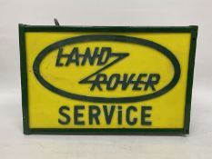 A LAND ROVER SERVICE ILLUMINATED SIGN