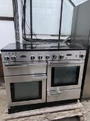 A RANGEMASTER BLACK AND CHROME OVEN AND INDUCTION HOB