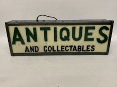 AN ANTIQUES AND COLLECTABLES ILLUMINATED SIGN