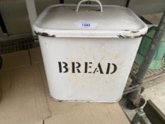 A WHITE ENAMEL BREAD BIN WITH LID