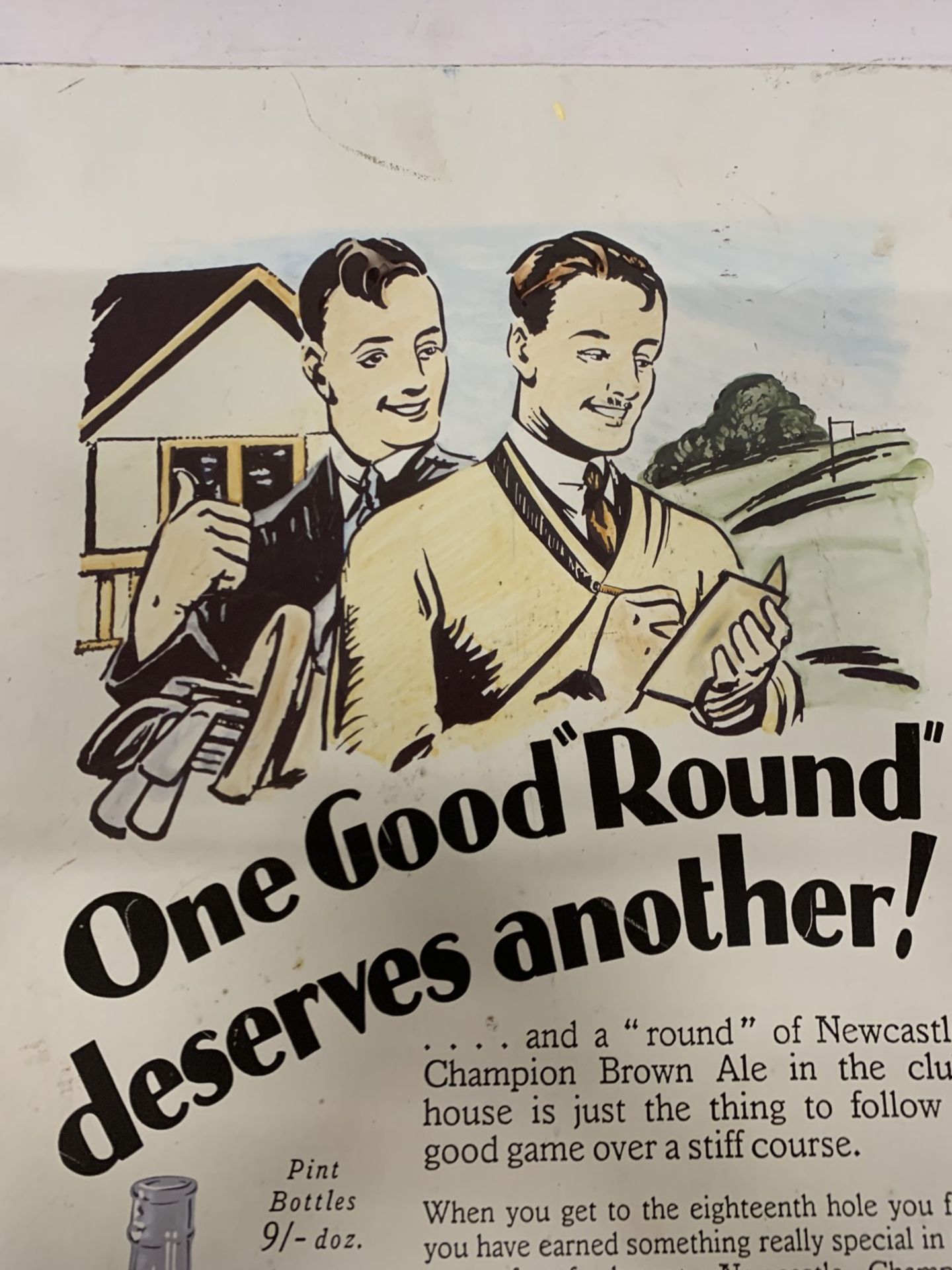 A LARGE VINTAGE TIN NEWCASTLE BROWN ADVERTISING SIGN 'ONE GOOD ROUND DESERVES ANOTHER' 62CM x 39CM - Image 3 of 3