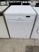 A WHITE INDESIT DISHWASHER