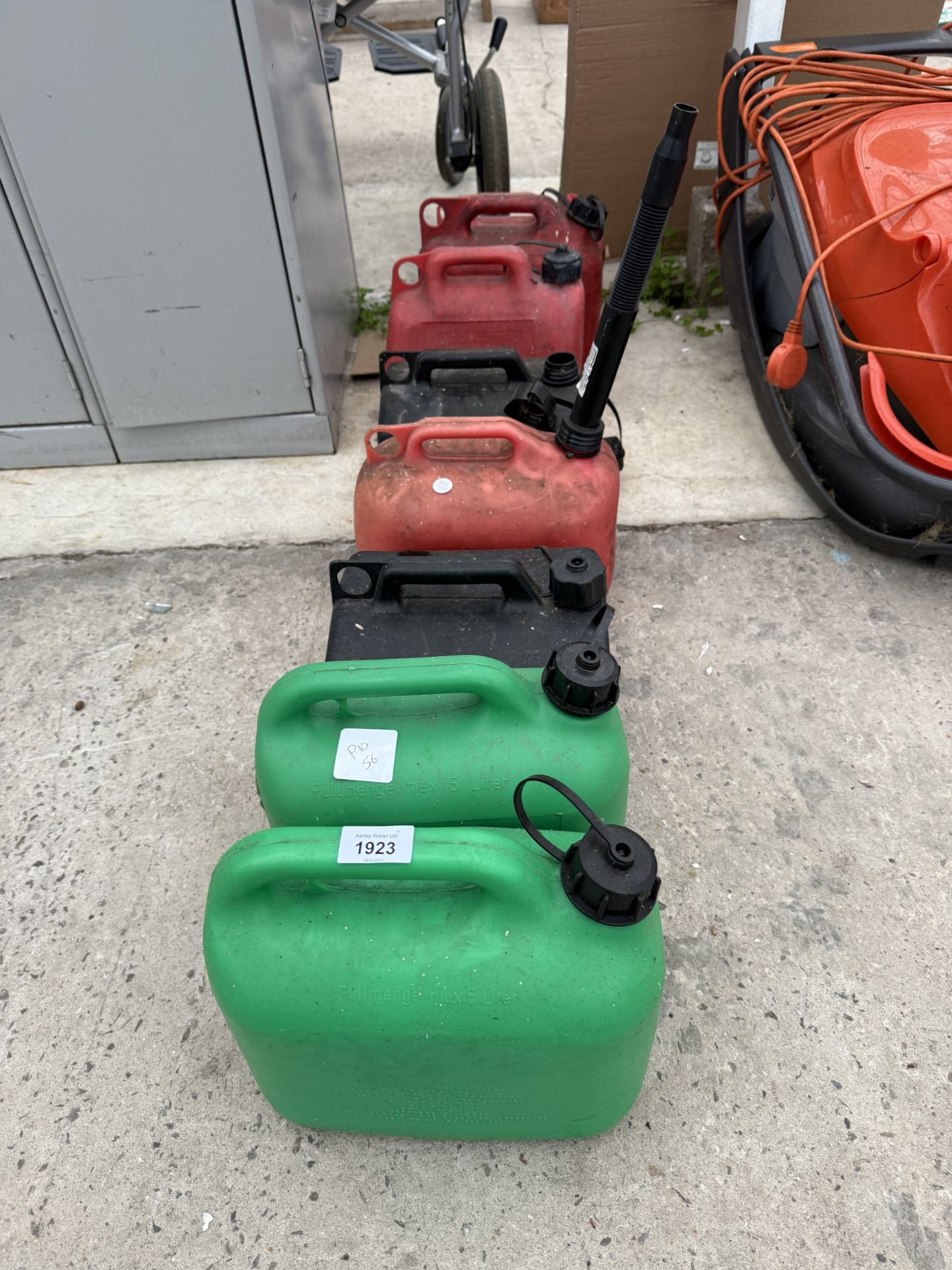 EIGHT PLASTIC FUEL CANS