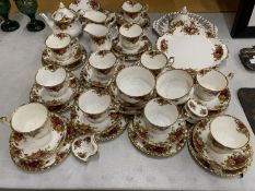 A LARGE COLLECTION OF ROYAL ALBERT 'OLD COUNTRY ROSES' TEAWARE TO INCLUDE A SMALL TEAPOT, SUGAR