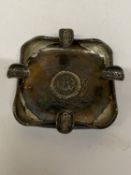 A CIRCA 1905 PERUVIAN SILVER ASHTRAY WITH COINS